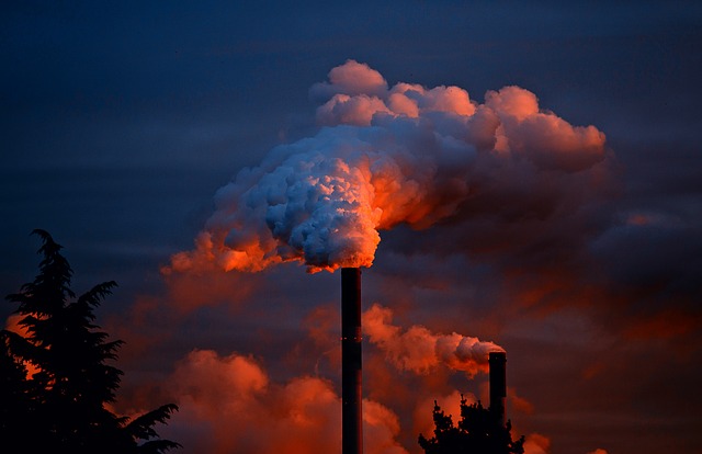 smoke stack at sunset